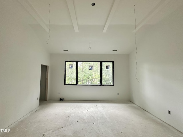 7809 Haymarket Ln, Raleigh, NC 27615 - empty room with beam ceiling