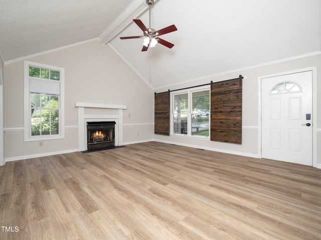 129 Nottingham Ct, Youngsville, NC 27596 - unfurnished living room with ceiling fan, light wood-style floors, and a fireplace with flush hearth