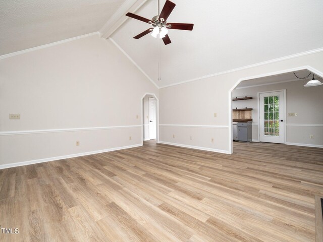 129 Nottingham Ct, Youngsville, NC 27596 - unfurnished living room with ceiling fan, arched walkways, light wood-style floors, and crown molding