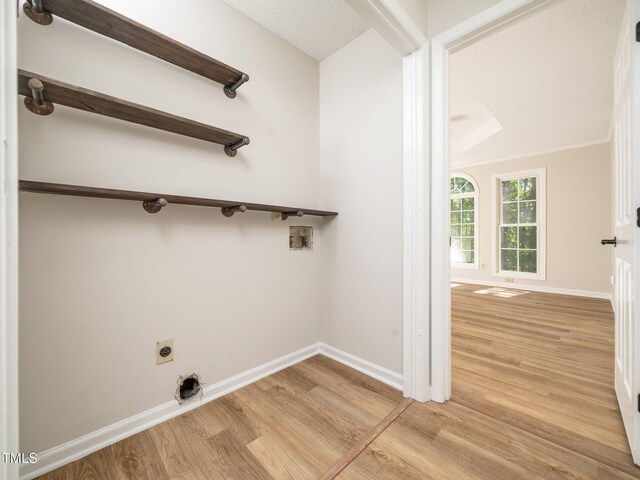 129 Nottingham Ct, Youngsville, NC 27596 - washroom with electric dryer hookup, washer hookup, and light wood-style floors