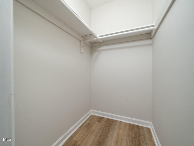 129 Nottingham Ct, Youngsville, NC 27596 - spacious closet featuring wood finished floors