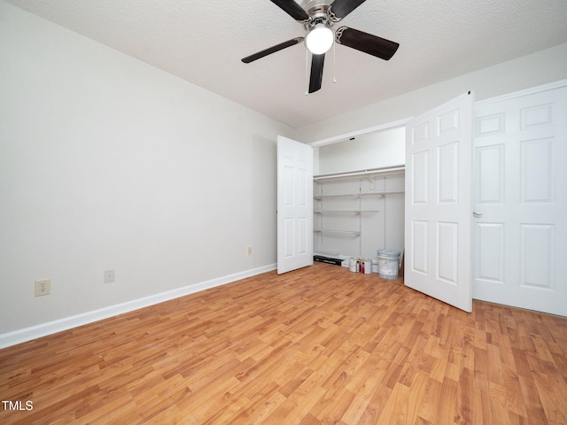 129 Nottingham Ct, Youngsville, NC 27596 - unfurnished bedroom featuring light wood-style floors, ceiling fan, and a closet