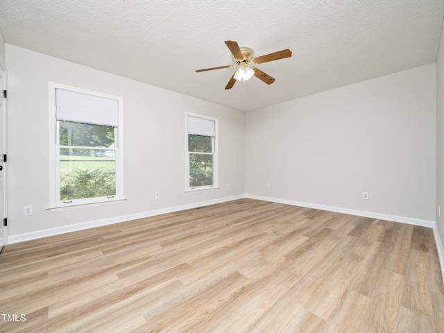 129 Nottingham Ct, Youngsville, NC 27596 - empty room featuring ceiling fan, light wood finished floors, and a textured ceiling