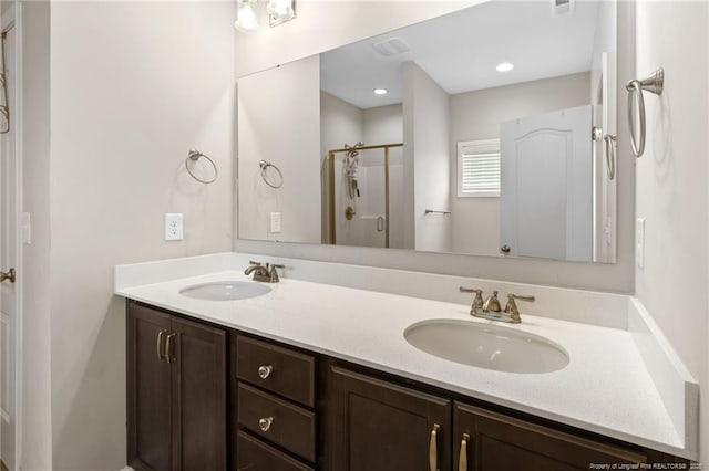 1657 Stackhouse Dr, Fayetteville, NC 28314 - bathroom with double vanity and a shower stall