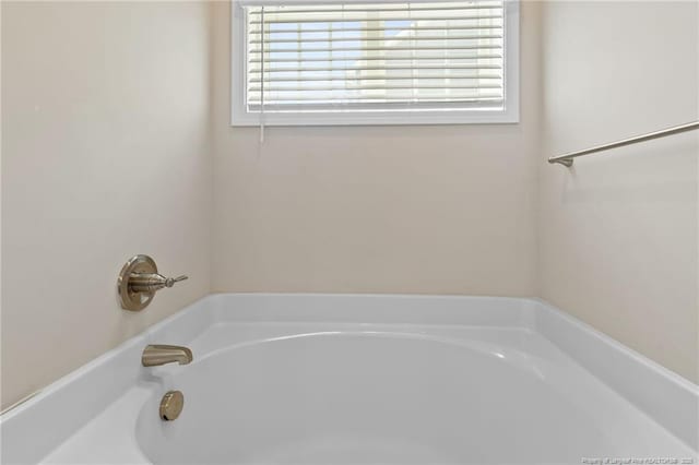 1657 Stackhouse Dr, Fayetteville, NC 28314 - full bathroom with a garden tub