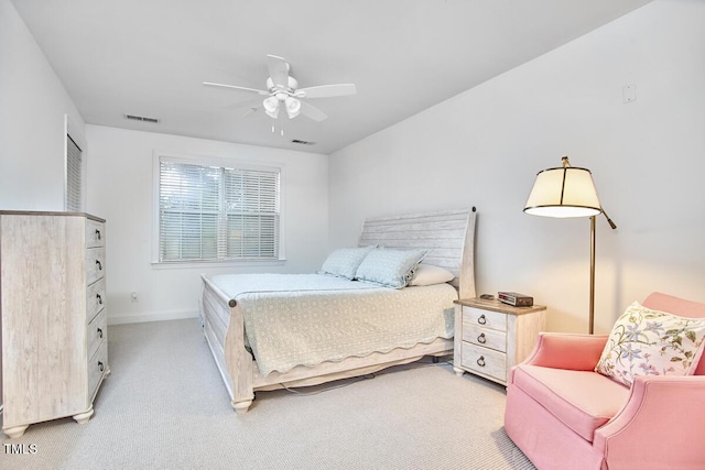10410 Rosegate Ct Unit 105, Raleigh, NC 27617 - bedroom with light colored carpet and a ceiling fan