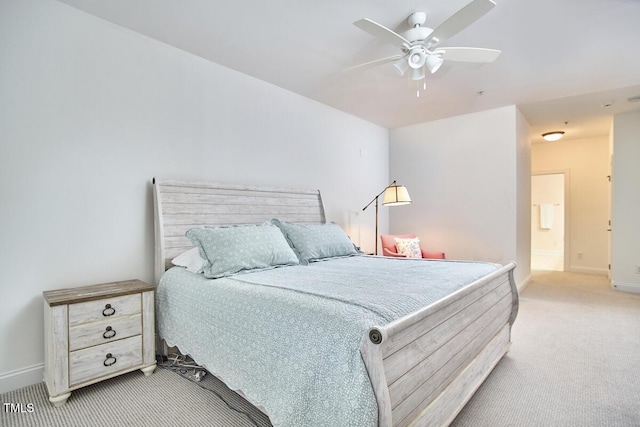 10410 Rosegate Ct Unit 105, Raleigh, NC 27617 - bedroom featuring light carpet, ceiling fan, and connected bathroom