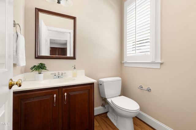 201 Weathervane Dr, Carrboro, NC 27510 - half bathroom featuring vanity and wood finished floors