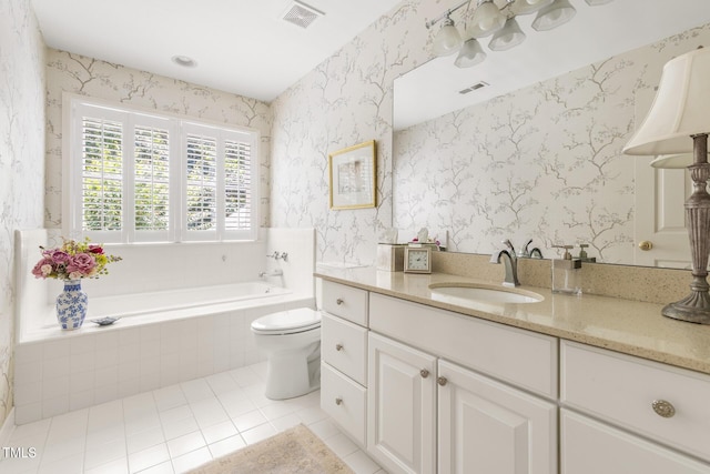 201 Weathervane Dr, Carrboro, NC 27510 - bathroom featuring tile patterned floors, a garden tub, vanity, and wallpapered walls