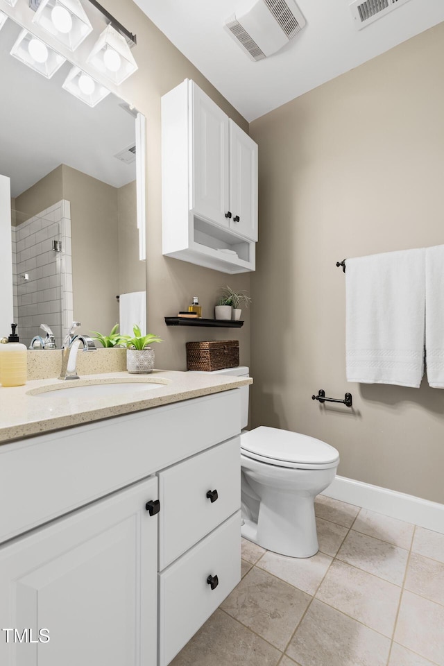 201 Weathervane Dr, Carrboro, NC 27510 - bathroom with vanity, a tile shower, and tile patterned flooring