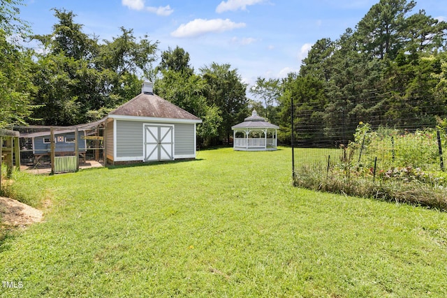 201 Weathervane Dr, Carrboro, NC 27510 - view of grassy yard with a gazebo and a shed