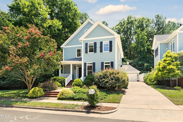 201 Weathervane Dr, Carrboro, NC 27510 - view of front of property with a porch and a detached garage