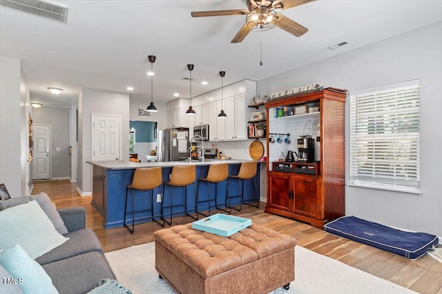 109 Covenant Rock Ln, Holly Springs, NC 27540 - living room featuring a ceiling fan, light wood-type flooring, and recessed lighting
