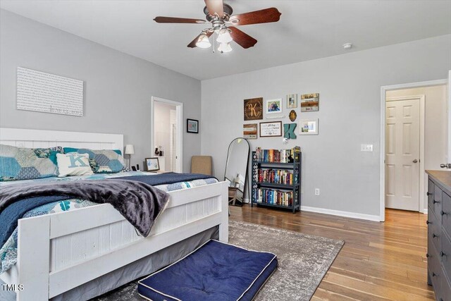 109 Covenant Rock Ln, Holly Springs, NC 27540 - bedroom with wood finished floors and ceiling fan