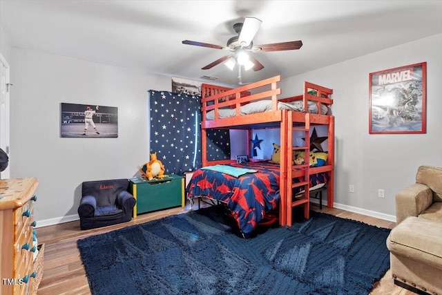 109 Covenant Rock Ln, Holly Springs, NC 27540 - bedroom with wood finished floors and a ceiling fan