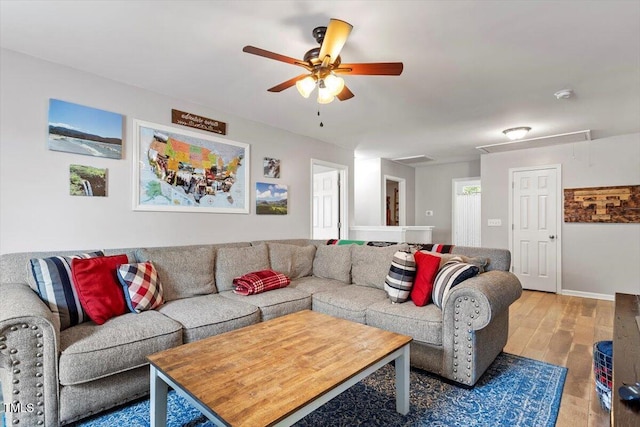 109 Covenant Rock Ln, Holly Springs, NC 27540 - living room featuring attic access, a ceiling fan, and wood finished floors