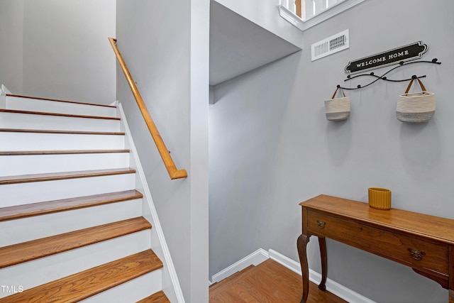 5809 Cameo Glass Way, Raleigh, NC 27612 - stairs featuring wood finished floors and baseboards