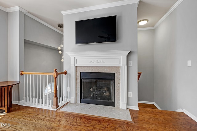 5809 Cameo Glass Way, Raleigh, NC 27612 - detailed view of wood finished floors, ornamental molding, and a fireplace with flush hearth