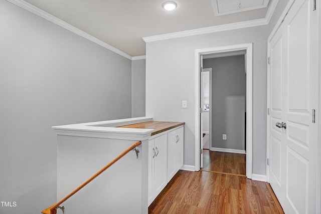 5809 Cameo Glass Way, Raleigh, NC 27612 - hallway featuring wood finished floors and ornamental molding