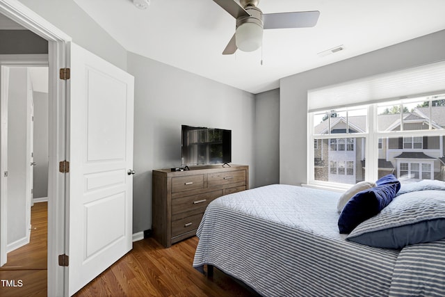 5809 Cameo Glass Way, Raleigh, NC 27612 - bedroom with wood finished floors and ceiling fan