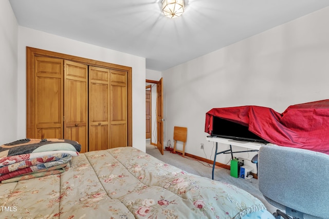128 Chris Ct, Garner, NC 27529 - carpeted bedroom featuring baseboards and a closet