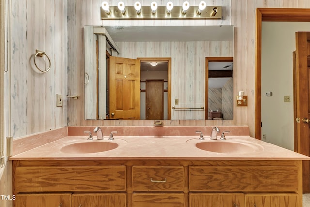 128 Chris Ct, Garner, NC 27529 - bathroom featuring double vanity and wallpapered walls