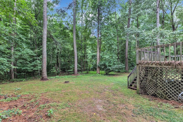 128 Chris Ct, Garner, NC 27529 - view of grassy yard with stairway and a deck