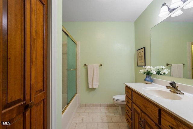 8704 Mill House Ln, Bahama, NC 27503 - bathroom featuring vanity and shower / bath combination with glass door