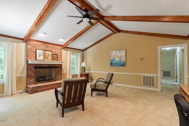 8704 Mill House Ln, Bahama, NC 27503 - living room with a ceiling fan, light carpet, and a fireplace