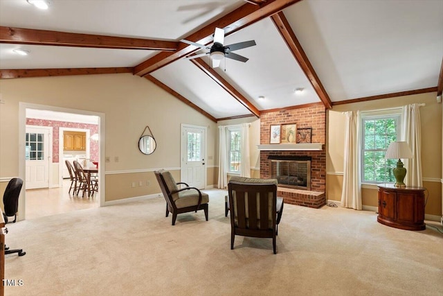 8704 Mill House Ln, Bahama, NC 27503 - carpeted living area with healthy amount of natural light, a ceiling fan, and a fireplace