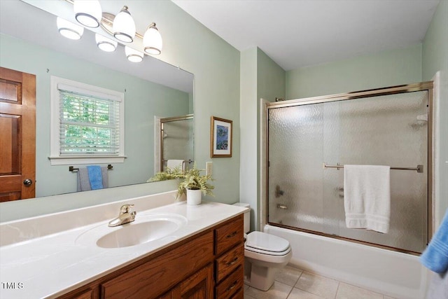 8704 Mill House Ln, Bahama, NC 27503 - full bath with vanity, tile patterned floors, and combined bath / shower with glass door