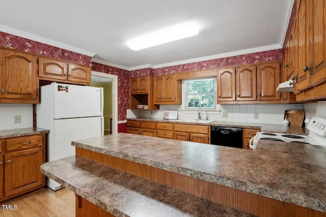 8704 Mill House Ln, Bahama, NC 27503 - kitchen with white appliances, under cabinet range hood, backsplash, a peninsula, and crown molding