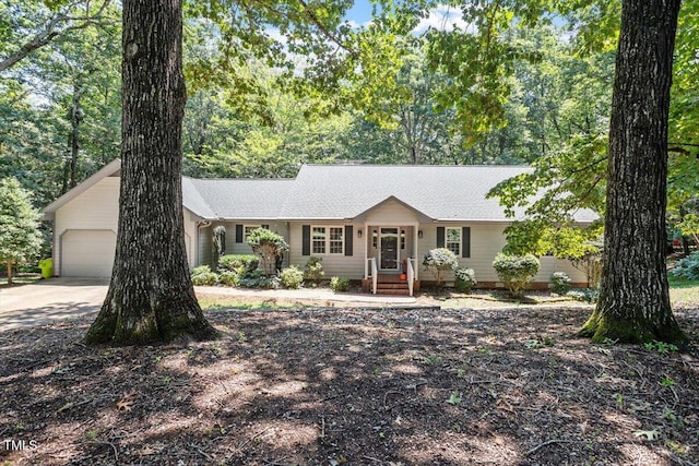 8704 Mill House Ln, Bahama, NC 27503 - single story home featuring an attached garage, a shingled roof, and concrete driveway