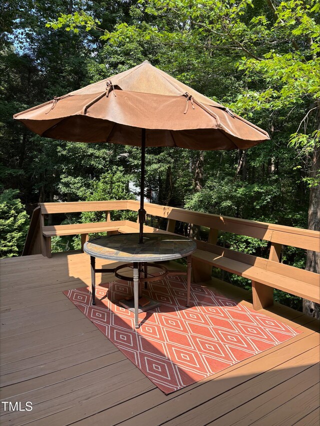 8704 Mill House Ln, Bahama, NC 27503 - wooden terrace featuring outdoor dining area