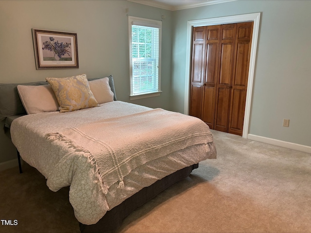8704 Mill House Ln, Bahama, NC 27503 - bedroom featuring crown molding, light colored carpet, and a closet