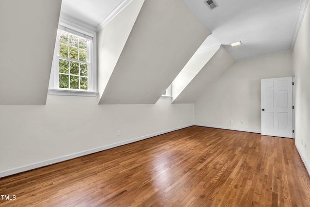 1820 Hunting Ridge Rd, Raleigh, NC 27615 - additional living space featuring wood finished floors and lofted ceiling