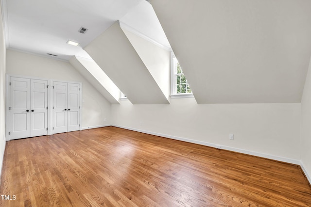 1820 Hunting Ridge Rd, Raleigh, NC 27615 - additional living space featuring a skylight, light wood-style floors, and lofted ceiling