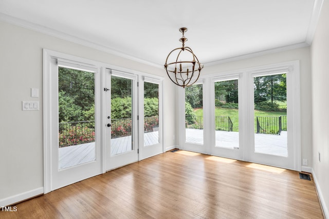 1820 Hunting Ridge Rd, Raleigh, NC 27615 - unfurnished sunroom with french doors and a chandelier