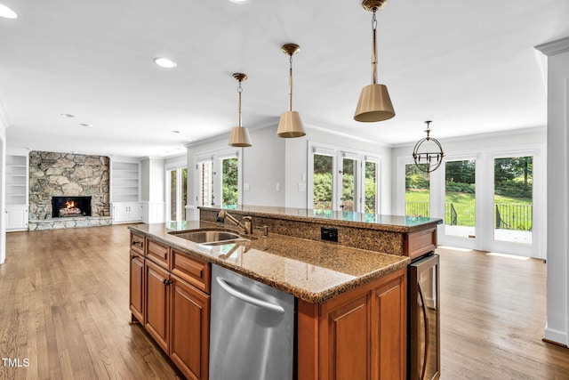 1820 Hunting Ridge Rd, Raleigh, NC 27615 - kitchen with dishwasher, wine cooler, brown cabinetry, plenty of natural light, and ornamental molding