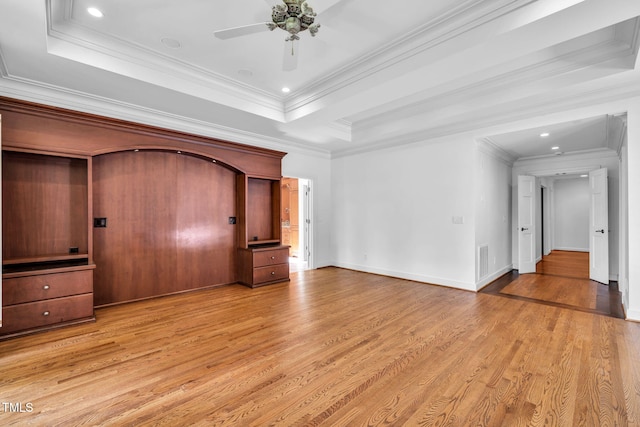 1820 Hunting Ridge Rd, Raleigh, NC 27615 - unfurnished bedroom with a tray ceiling, light wood finished floors, crown molding, recessed lighting, and ceiling fan