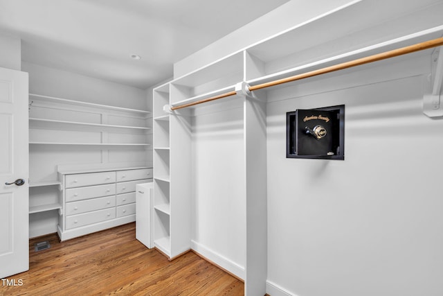 1820 Hunting Ridge Rd, Raleigh, NC 27615 - walk in closet with wood finished floors