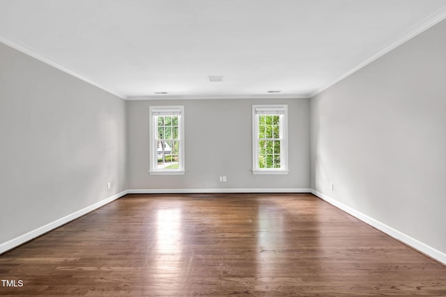 1820 Hunting Ridge Rd, Raleigh, NC 27615 - empty room with wood finished floors and crown molding