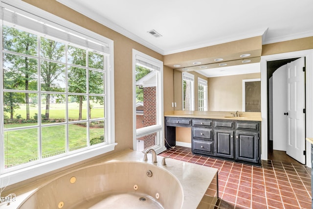 1820 Hunting Ridge Rd, Raleigh, NC 27615 - bathroom featuring a whirlpool tub, vanity, healthy amount of natural light, and ornamental molding