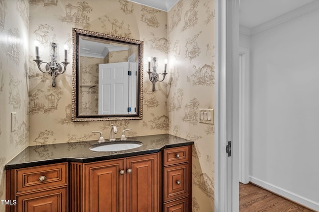 1820 Hunting Ridge Rd, Raleigh, NC 27615 - bathroom with vanity, wood finished floors, and crown molding