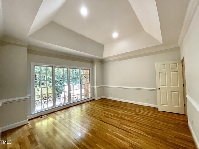 21 Covington Ln, Durham, NC 27712 - unfurnished room with wood finished floors, recessed lighting, and a raised ceiling
