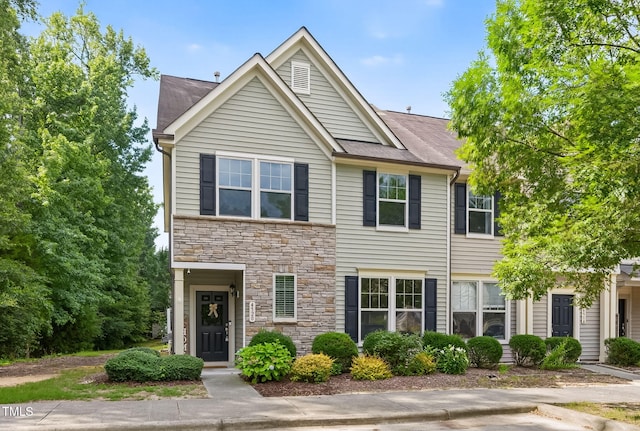 4520 Middletown Dr, Wake Forest, NC 27587 - view of property featuring stone siding and roof with shingles