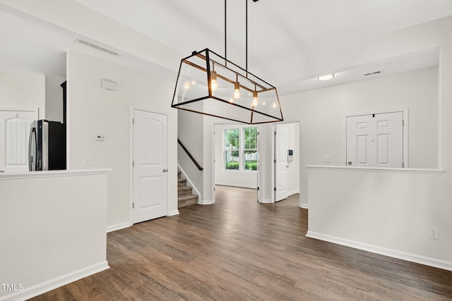 4520 Middletown Dr, Wake Forest, NC 27587 - foyer entrance with stairway, wood finished floors, and a chandelier