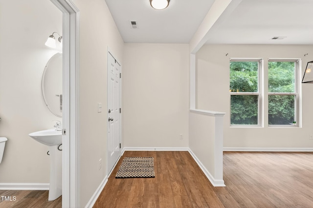 4520 Middletown Dr, Wake Forest, NC 27587 - foyer entrance featuring wood finished floors and baseboards