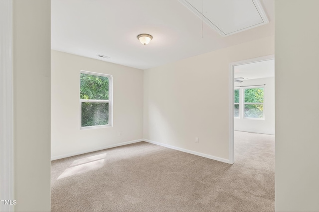 4520 Middletown Dr, Wake Forest, NC 27587 - unfurnished room with attic access, carpet floors, and healthy amount of natural light