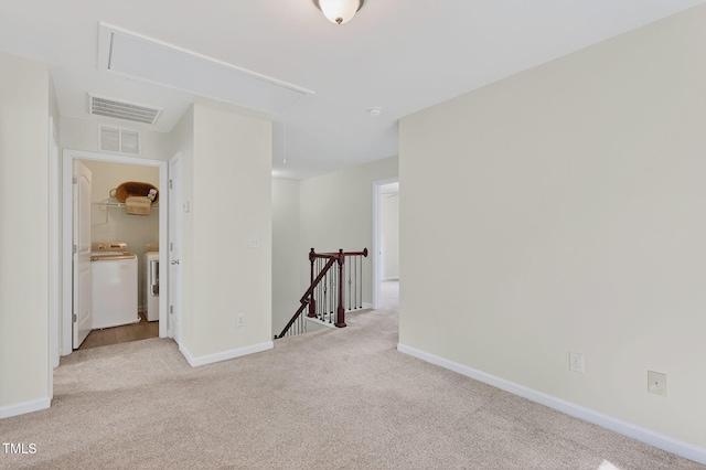 4520 Middletown Dr, Wake Forest, NC 27587 - empty room featuring attic access, washing machine and dryer, and carpet flooring